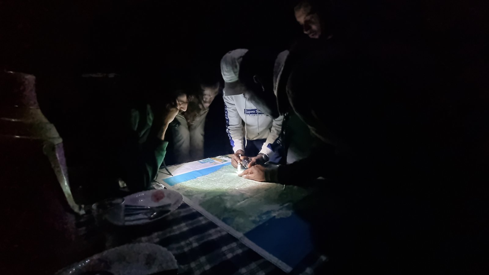 Late in the night reading maps